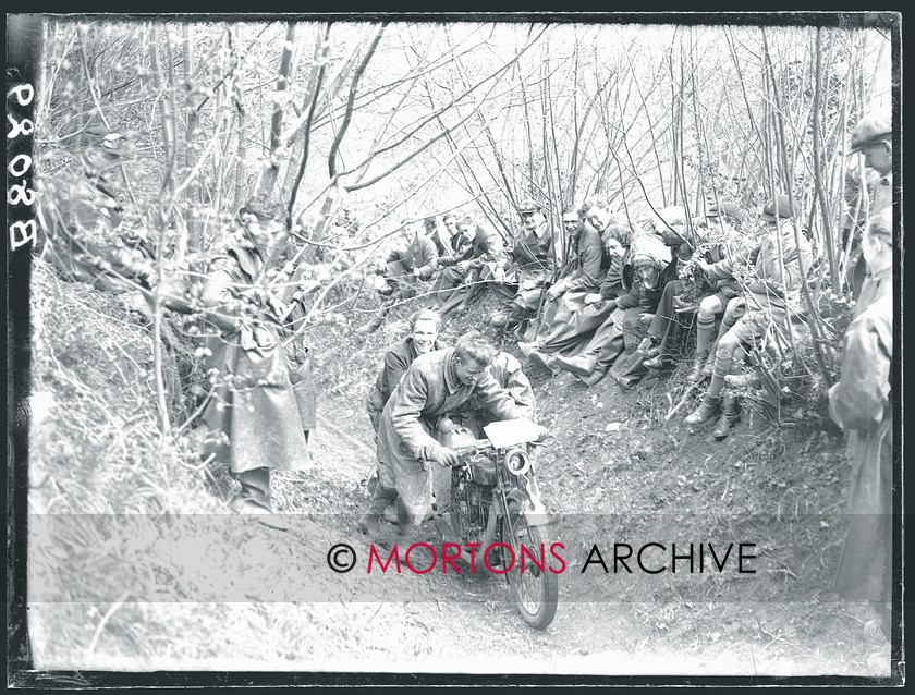 TCM FTP 12 
 Carshalton Motorcycle Club's Pillion Trial, May 1932. Overhead valve flat-tanker, possibly an AJS. At least it's providing plenty of laughs! 
 Keywords: glass plate, Mortons Archive, Mortons Media Group Ltd, Straight from the plate
