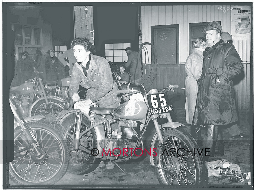 Scot 6 day 54  006 
 Scottish Six Day Trial 1954 - Miss Kevelos smiles for the camera 
 Keywords: Classic Issues - Feet up in the 50s, Glass plate, Mortons Archive, Mortons Media Group, Off road