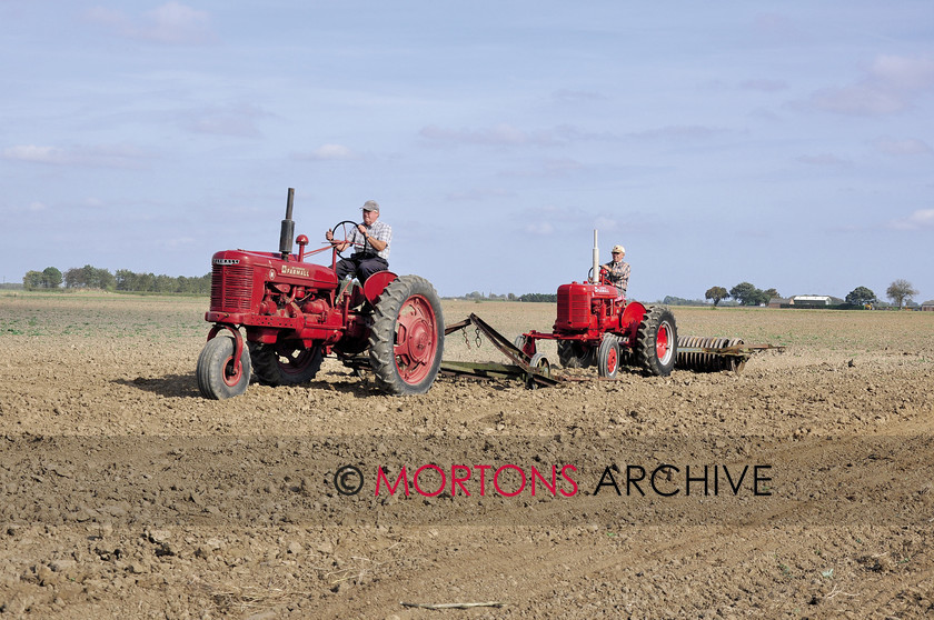 003 0496 
 Ken Barber on the Farmall H with Maurice Coupland on a Farmell A 
 Keywords: 2015, February, Mortons Archive, Mortons Media Group Ltd, Tractor and Farming Heritage
