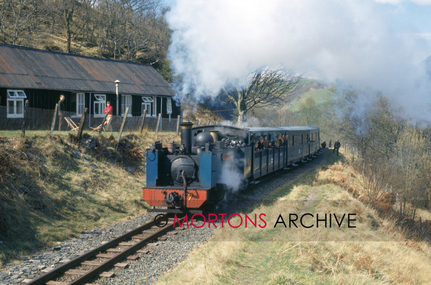 WD594879@064 STEAMING pic 
 In BR blue livery, Vale of Rheidol, 2-6-2T No 7 Owain Glyndwr approaches Devil's Bridge on the Vale of Rheidol lin on 28th April 1973. 
 Keywords: Heritage Railway, Mortons Archive, Mortons Media Group