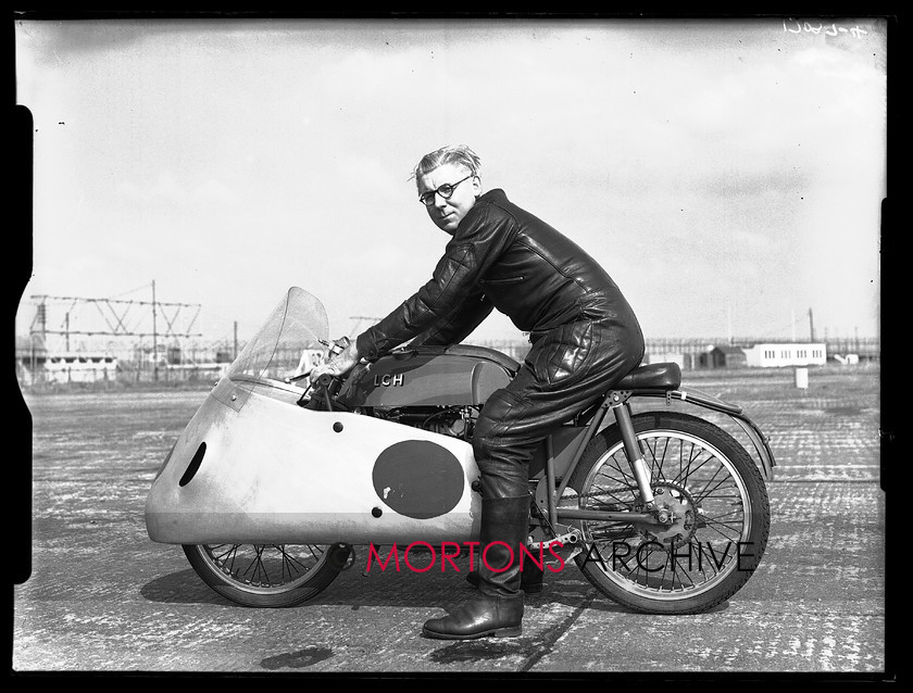 17097-04 
 'Specials Day' at Silverstone 1956. Built and campaigned by Len Harfield, the 125cc LCH. 
 Keywords: 125cc, 17094-04, 1956, glass plate, lch, Mortons Archive, Mortons Media, Mortons Media Group Ltd, silverstone, specials, Specials Silverstone 1956, Straight from the plate, tcm, the classic motorcycle