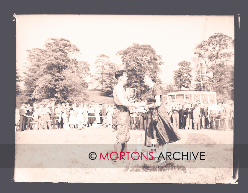 064 SFTP 02 
 Jeff Smith is awarded the Motor Cycling National Trophy during the presentation 
 Keywords: 2012, Glass plate, January, Lancashire Grand National 1956, Mortons Archive, Mortons Media Group, Straight from the plate, The Classic MotorCycle