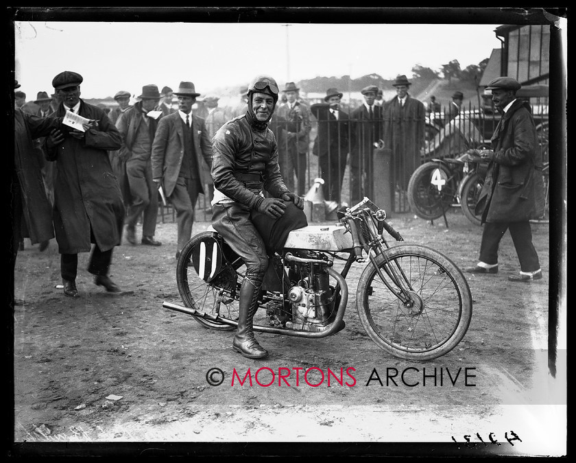 A2131 
 British Motor Cycle Racing Club's 5th monthly meeting, Brooklands 1923. Headlam, winner of the 350cc handicap race, poses on his 349cc oil-cooled Bradshaw engined Dot. 
 Keywords: 1923, 5th meeting, A2131, bmcrc, brooklands, December 2009, glass plate, Straight from the plate, The Classic Motorcycle