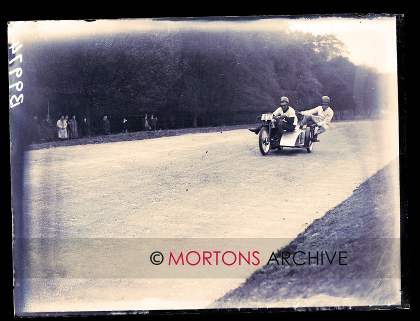 062 SFTP 4 
 Straight from the plate - Easter meeting Donington 1933 - Spectacular performance from Richards and friend, on their 896cc Douglas. They came third. 
 Keywords: 1933, Donington Park, Glass plate, Mortons Archive, Mortons Media Group, Straight from the plate