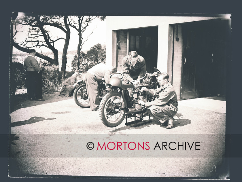 SFTP TT Practice 1957 04 
 A hive of activity in the Peel garages. 
 Keywords: 1957 Practice TT, Issue, Mortons Archive, Mortons Media Group, October 2011, Straight from the plate, The Classic MotorCycle