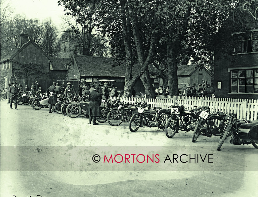 TCM 059 Glass Plates6 
 1923 Suffolk trial - Competitors machines lined up. The start was at Hintlesham, near Ipswich. 
 Keywords: 1923, Glass Plate Collection, Mortons Archive, Mortons Media Group Ltd, Straight from the plate, The Classic MotorCycle