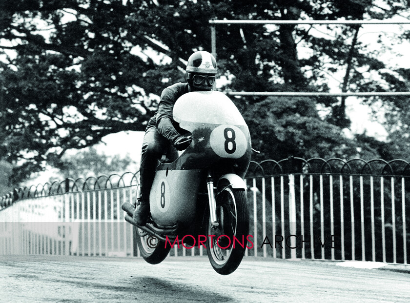 Agostini-007 
 Giacomo Agostini (500 MV) leaping Ballaugh Bridge on the Friday evening practice 1965, he was the fastest 500.