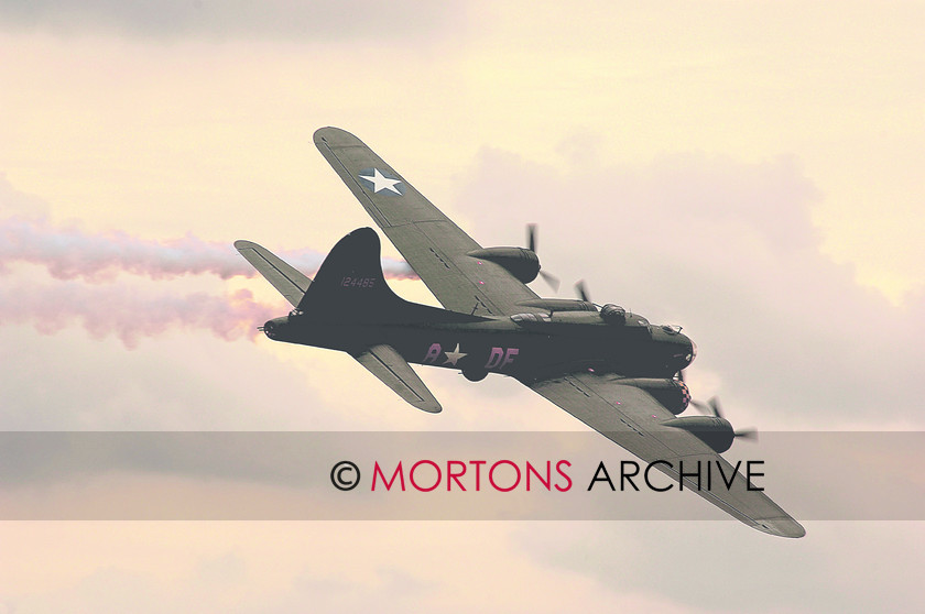 98 avclassics 008 03 
 One of Sally B's party pieces at airshows, a slow flypast with two engines smoking, commemorating the way many B-17s returned from raids, shot up and limping home on tw. 
 Keywords: Aviation Classics, Issue 8 Boeing, Mortons Archive, Mortons Media Group
