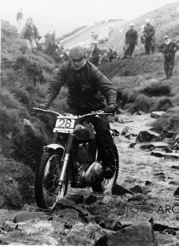 NNC-T-A-44 
 NNC T A 044 - Mick Andrews on a 347cc AJS in the 1961 Northern Experts Trial on Cheeks, his first time out on the works AJS 
 Keywords: Mortons Archive, Mortons Media Group Ltd, Nick Nicholls, Trials