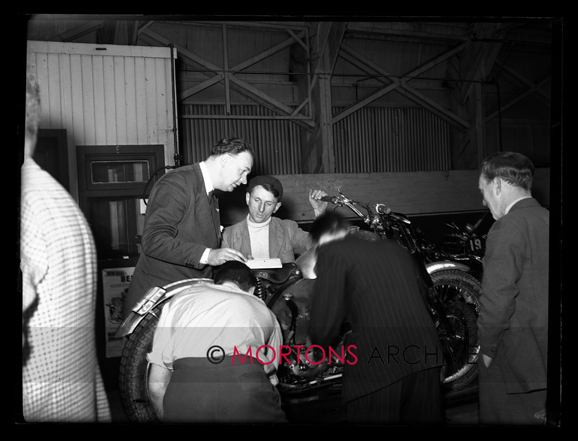 15199-13 
 1953 Scottish Six Days Trial (SSDT). One of the pre-event favourites Johnny Draper (BSA) at the weigh in. 
 Keywords: 15199-01, 1953, 6 day trial, glass plate, may 1953, Mortons Archive, Mortons Media, scottish, Straight from the plate, The Classic Motorcycle, trial, 15199-02, 15199-03, 15199-04, 15199-05, 15199-06, 15199-07, 15199-08, 15199-09, 15199-10, 15199-11, 15199-12, 15199-13