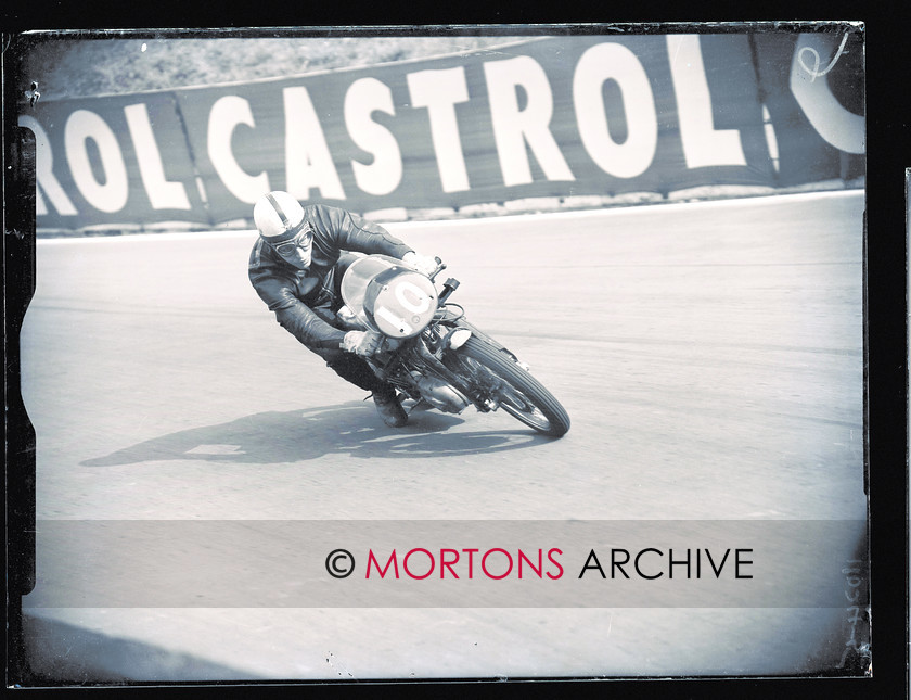 053 SFTP 5 
 Crystal Palace , August 1957 - NSU Sportsmax-mounted John Surtees was king of the track in 1957, and is showing racing to vistory in the 250cc final 
 Keywords: 2014, Crystal Palace, Glass plates, Mortons Archive, Mortons Media Group Ltd, November, Straight from the plate, The Classic MotorCycle