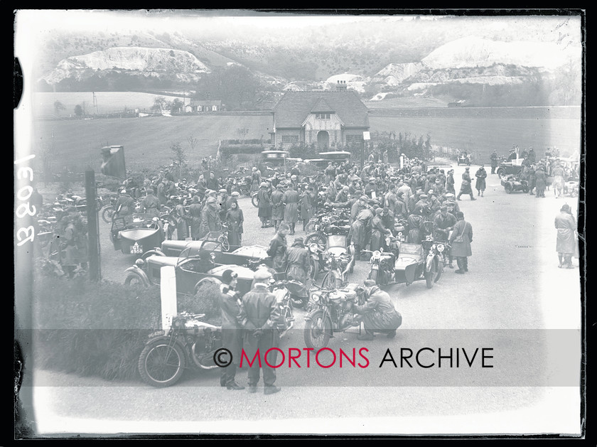 TCM FTP 13 
 Carshalton Motorcycle Club's Pillion Trial, May 1932. Nearest the camera is an Ariel, behind a side-valve Norton is fettled. 
 Keywords: glass plate, Mortons Archive, Mortons Media Group Ltd, Straight from the plate
