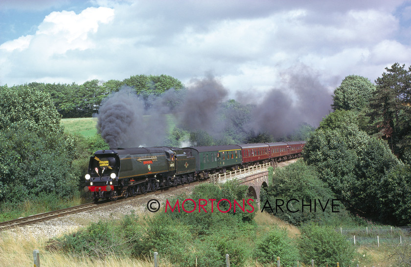 WD594794@64 preservation 00 
 SR unrebuilt Bulleid Battle of Britian Pacific No 34092 City of Wells passes Braford St Martin with Salisbury - Yeovil Junction train on 24th July 1988. 
 Keywords: Heritage Railway, Mortons Archive, Mortons Media Group