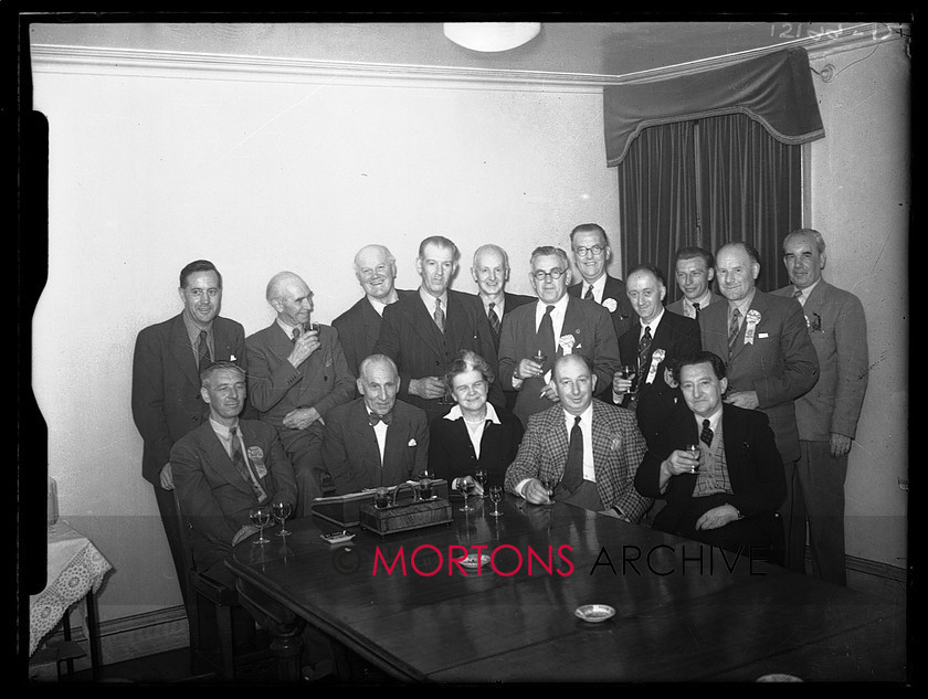 15199-03 
 1953 Scottish Six Days Trial (SSDT). Group photograph of what would seem to be the organising committee, plus guests. 
 Keywords: 15199-01, 1953, 6 day trial, glass plate, may 1953, Mortons Archive, Mortons Media, scottish, Straight from the plate, The Classic Motorcycle, trial, 15199-02, 15199-03, 15199-04, 15199-05, 15199-06, 15199-07, 15199-08, 15199-09, 15199-10, 15199-11, 15199-12, 15199-13
