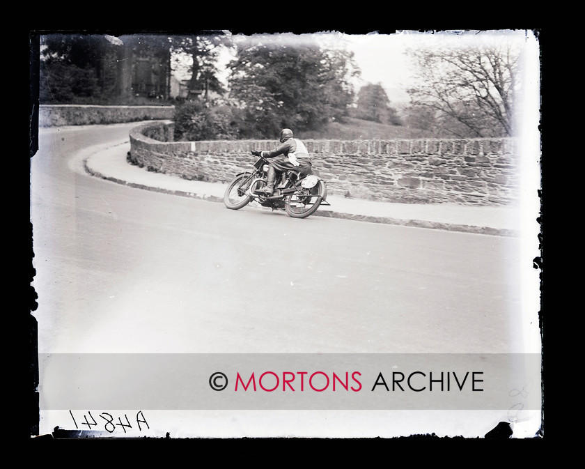 062 SFTP 10 1925 IOM Junior TT 
 1925 Junior TT - Harold Willis impressed on his Montgomery before being forced to retire, here he is at Braddon Bridge. 
 Keywords: Glass plate, Isle of Man, Junior TT, Mortons Archive, Mortons Media Group, September, Straight from the plate, The Classic MotorCycle