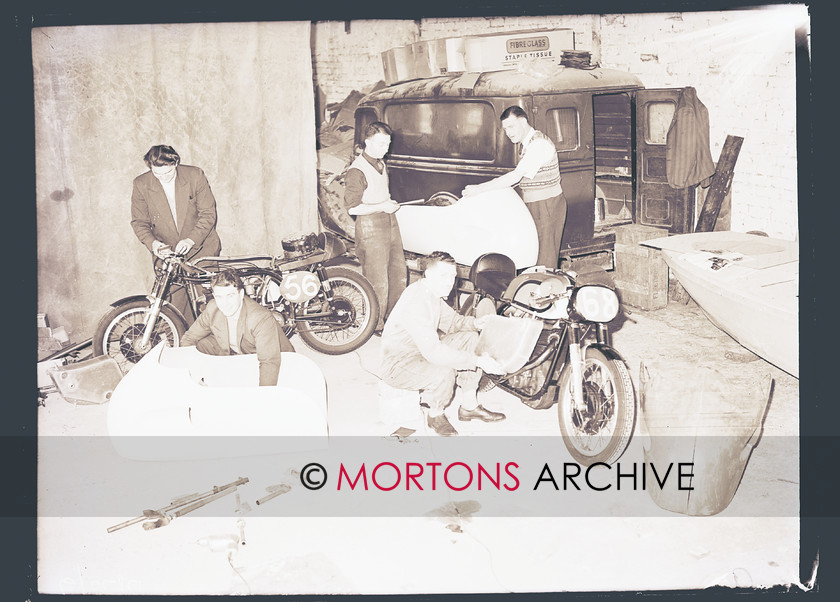 SFTP TT Practice 1957 06 
 A hive of activity in the Peel garages. 
 Keywords: 1957 Practice TT, Issue, Mortons Archive, Mortons Media Group, October 2011, Straight from the plate, The Classic MotorCycle