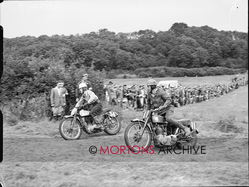 Straight FTP 09 
 Jeff Smith just leading. 
 Keywords: 1954 Experts Grand Natinal Scramble, Action, Dec 10, Mortons Archive, Mortons Media Group, Straight from the plate, The Classic MotorCycle