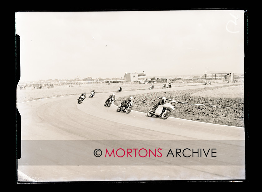 062 Glass Plate 01 
 Aintree road racing September5 1954 - Amm (Norton) leads McIntyre (AJS, 29), Surtees (Norton, 3), Carter (Norton, 4), Coleman (AJS, 28) and Farrant (AJS, 30) in the 350cc race. 
 Keywords: Glass plate, Mortons Archive, Mortons Media Group