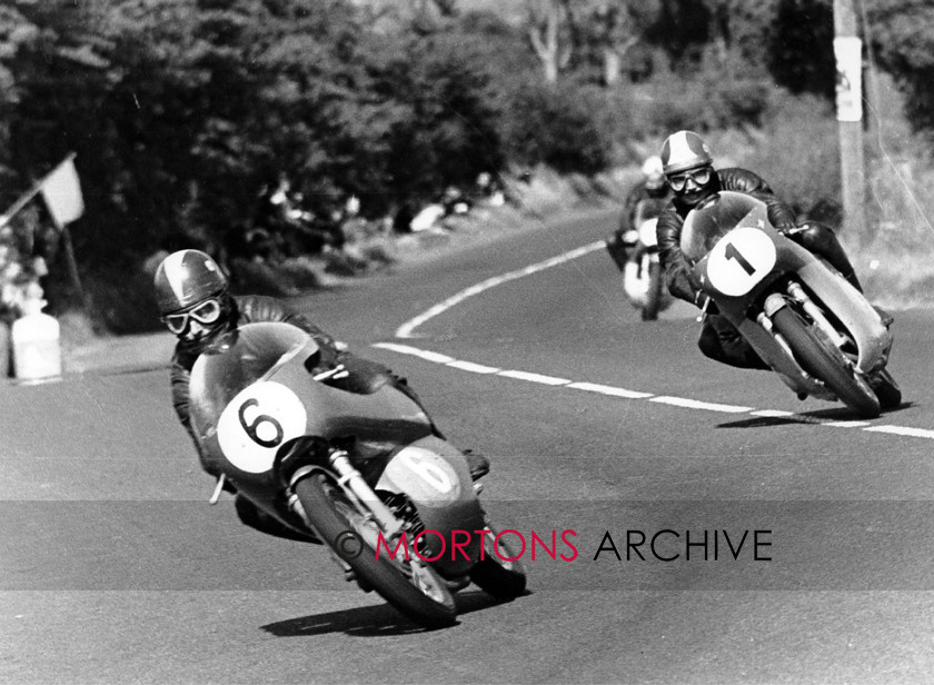 NNC RR C200049 
 NNC RR C200049 - No. 6 Kel Carruthers (Aermacchi) leads No. 1 Giacommo Agostini (MV) at Wheelers Corner in the 350cc Ulster GP 17.08.68. Agostini won at 102.74mph with Carruthers second. 
 Keywords: Mortons Archive, Mortons Media Group, Nick Nicholls, Road Racing