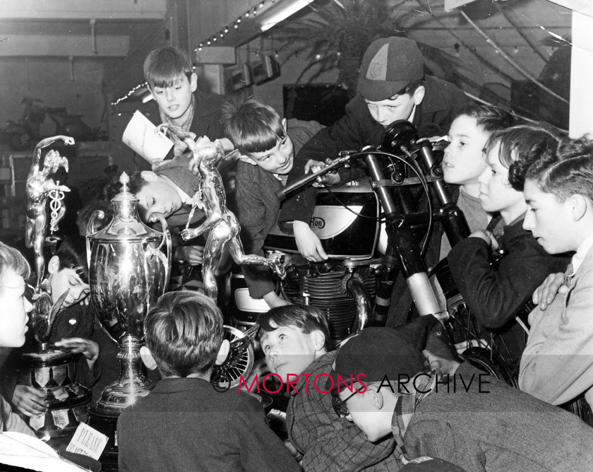 006 GEC0000001 
 1949 - Earls Court - Geoff Duke's winning machine (TT). 
 Keywords: Earls Court, Mortons, Mortons Archive, Mortons Media Group