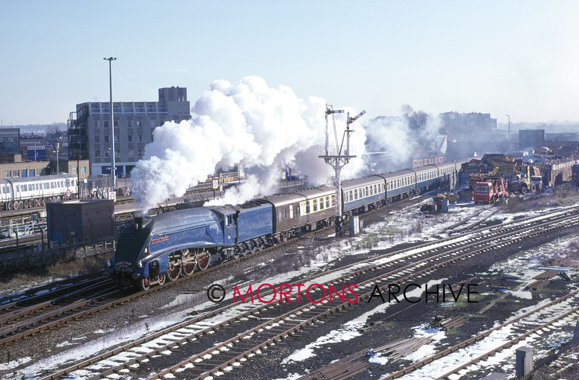 WD594793@64 preservation 01 
 The engine which inaugurated steam operation from London in 1985. LNER A4 Pacific No 4498 Sir Nigel Gresley passes Neasden with Marylebone - Stratford - Birmingham train on 16th February 1985. 
 Keywords: Heritage Railway, Mortons Archive, Mortons Media Group