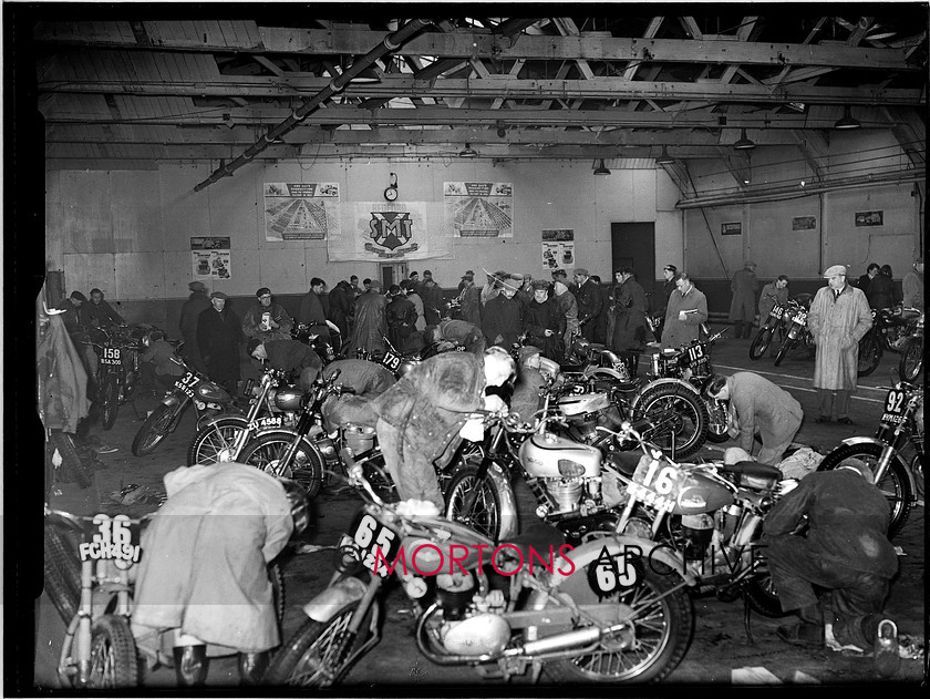 Scot 6 day 54  009 
 Scottish Six Day Trial 1954 - inside the SMT garage reading themselves for the 1954 Scottish 
 Keywords: Classic Issues - Feet up in the 50s, Glass plate, Mortons Archive, Mortons Media Group, Off road