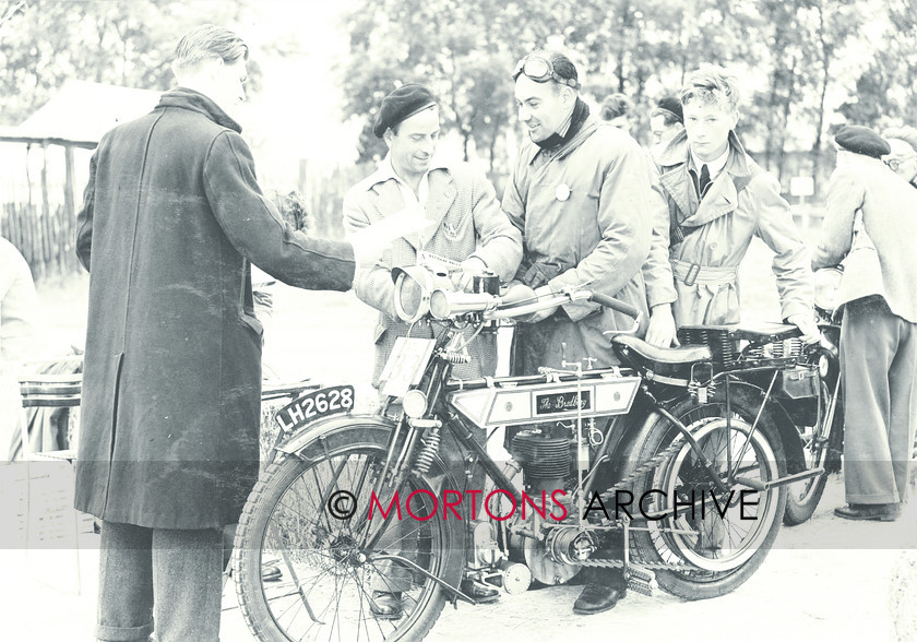 062 SFTP 02 
 R Pinnock, with his Phillipson-Pully equipped Bradbury, checks in at Billing. 
 Keywords: Mar 11, Mortons Archive, Mortons Media Group, Straight from the plate, The 1951 National ACU Rally, The Classic MotorCycle