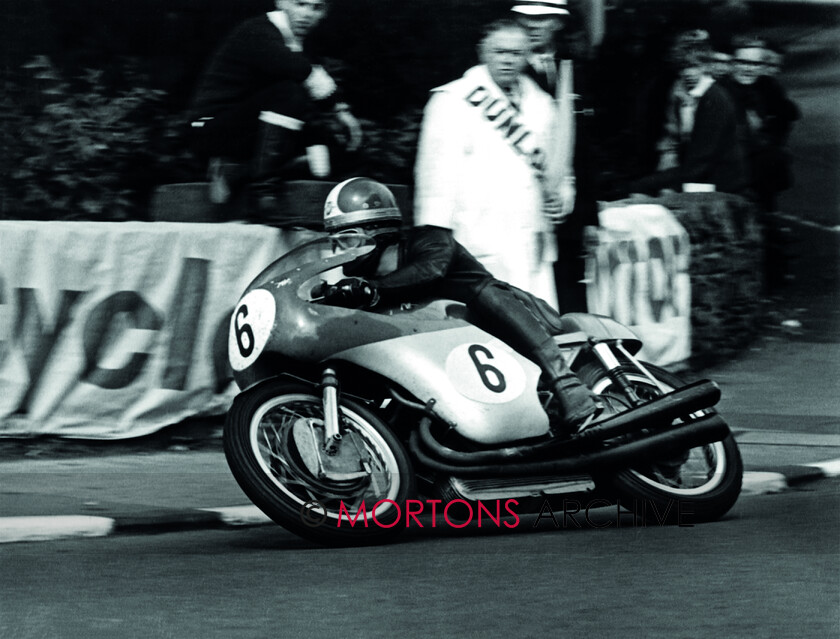 Agostini-014 
 From the Nick Nicholls Collection - 1966 Isle of Man Senior TT Giacomo Agostini on the 500cc MV-3 at Quarter Bridge.