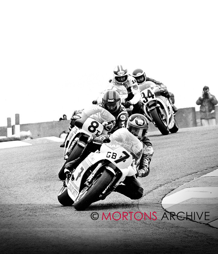 Barry Sheene Leading group 
 Barry Sheene's Suzuki leads the field aat Donington Park. Hard on his heals is Aussie Wayne Gardner, Keith Heuwen and American Mike Baldwin. 
 Keywords: Garage Wall Poster Collection No. 1