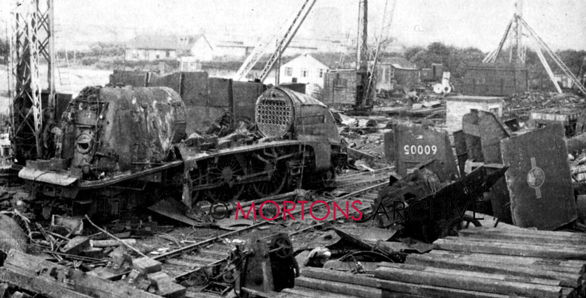 050 Scrapyard 01 
 An A4 that didn't make it... No. 60005 Sir Charles Newton in Airdries Atlas scrapyard as appeared in the January 1965 issue 
 Keywords: 2015, Archive Shot, January, Mortons Archive, Mortons Media Group Ltd, The Railway Magazine