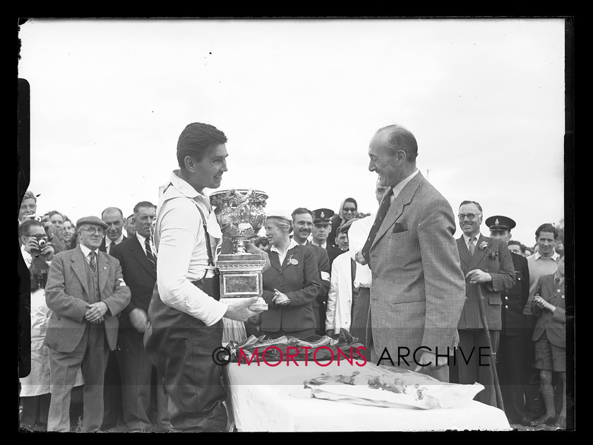 17308-24 
 "1956 British International Motocross GP" To the victor Archer, the spoils. 
 Keywords: 17308-24, 1956, british international, british international motocross gp, glass plate, motocross, September 2009, Straight from the plate, The Classic MotorCycle
