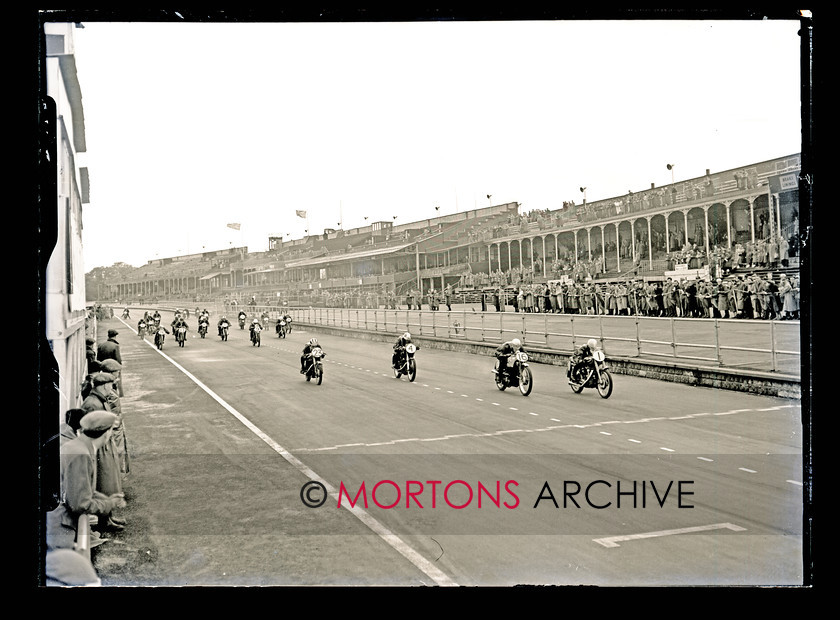 062 Glass Plate 04 
 Aintree road racing September5 1954 - The start of the 250cc race, note 16 A W Jones (prewar DKW) and 23 Bill Lomas (programmed as 'JEL' but on a Beasley Velocette). 
 Keywords: Glass plate, Mortons Archive, Mortons Media Group